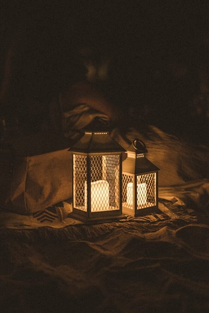 Photo by Artur Kornakov black and white lamp on brown textile