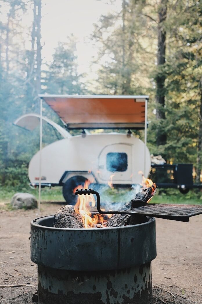 Photo by Josh Duke burning fire on black fire pit