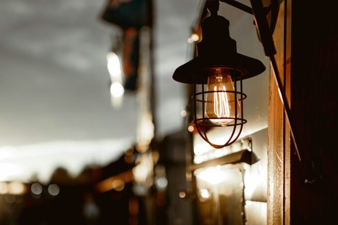 Photo by Bennie Bates A light hanging from the side of a building